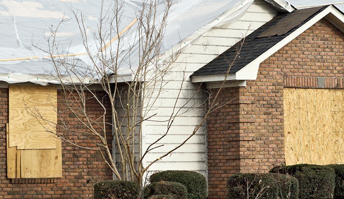 board up service tarp over roof residential house