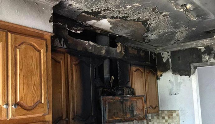 fire insurance claims kitchen cabinet wall fire and smoke damage