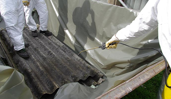 professional worker wear uniform asbestos removal