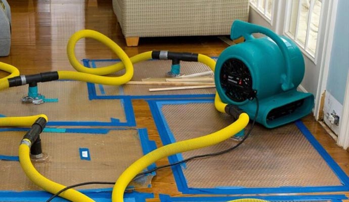 residential home water damage water extraction by equipment